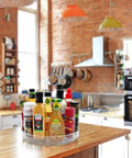 Two Pack 11 Inch Lazy Susan Organizer With Non Slip Turntable holding condiments on kitchen island