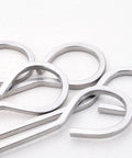 Close-up of stainless steel 10-inch square barbecue skewers with ring handles, 12-pack.