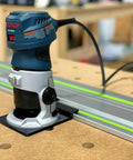 Plug And Play Guide Rail Adapter For Bosch Colt 1.25 HP Router mounted on aluminum track for precision dados and cuts.