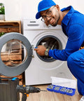 Smiling technician using Six Piece Screw Organizer Box With Lids Slanted Opening For Easy Grab And Go Access next to washing machine.