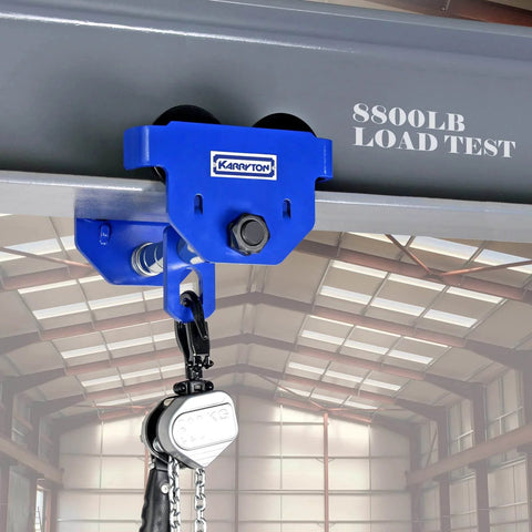 1 Ton Beam Trolley With Heavy Duty Manual Push, blue adjustable flange 2.5 to 8 inches, attached to I-beam with chain block in warehouse.
