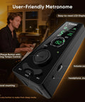Digital Metronome For Piano Guitar Drums With Clear LCD Screen And Flashing Light, 9 Rhythm Patterns, and user in background.