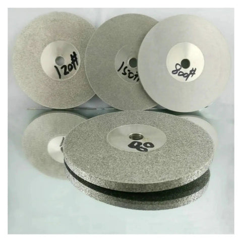 Double Sided Diamond Grinding Disc Wheel For Rotary Tools 100mm Diameter With 10mm Hole Grit Range 45 To 1000, four discs shown