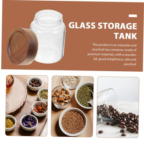 Set Of Three Airtight Glass Coffee Bean Storage Jars With Secure Screw Tops To Keep Your Loose Tea And Spice Stash Locked Down, with wooden lids.