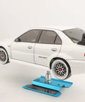 1/10 Scale RC Drift Tires 4 Pack On Road Wheels With 12mm Hex Hubs Beefy Hard Plastic Grip For Traxxas 4Tec 2.0 3.0 Tamiya TT01 XV01 Kyosho WR8 HPI Touring Cars on white RC car model