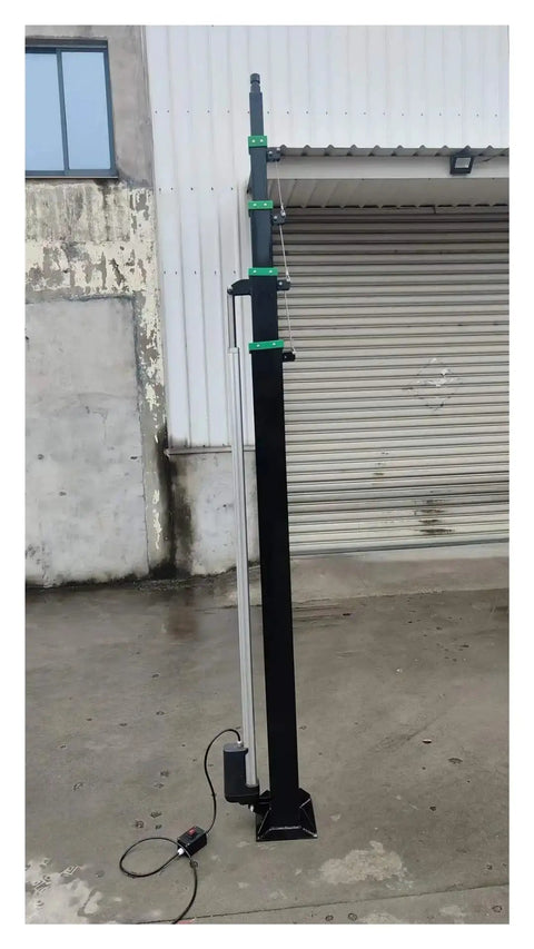 Workhorse Hydraulic Telescopic Wire Rope Mast 5 To 12 Meters with hand crank and electric drive standing vertically.