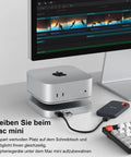 Heavy Hitter Mac Mini M4 Stand Hub delivering 40Gbps Thunderbolt expandability with connected storage device.