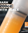 Front view of a 200cc fluid extractor with scale; syringe-style automotive oil pump with orange liquid.