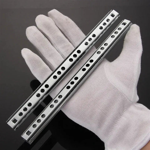 Solid Side Mount Ball Bearing Drawer Slides Two Pack Heavy Gauge Steel Cabinet Runners With Slick Silent Bearings shown in glove.