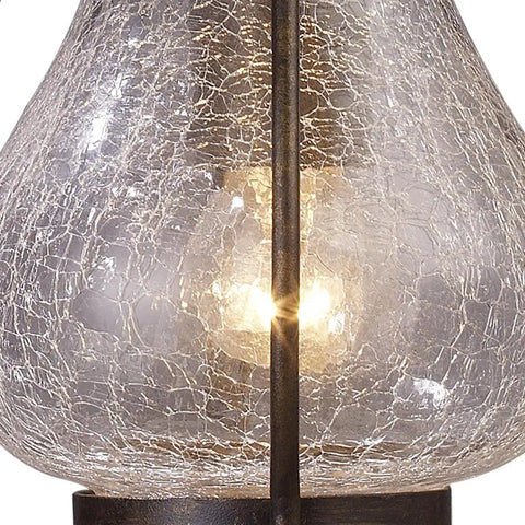 Close-up of clear crackle glass on Wikshire 8 Inch Wide 1 Light Outdoor Pendant In Coffee Bronze With Cast Aluminum Construction