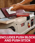 Heavy Six Inch Benchtop Jointer delivering smooth as butter finish with push block and stick for safety in use.
