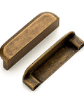 Rock Solid Antique Brass Cabinet Pulls For Kitchen Cabinets And Hefty Drawers 3 Inch Hole Center Top Shelf Furniture Hardware That Is Totally Built To Last 10 Pack, showing two oxidized metal handles.