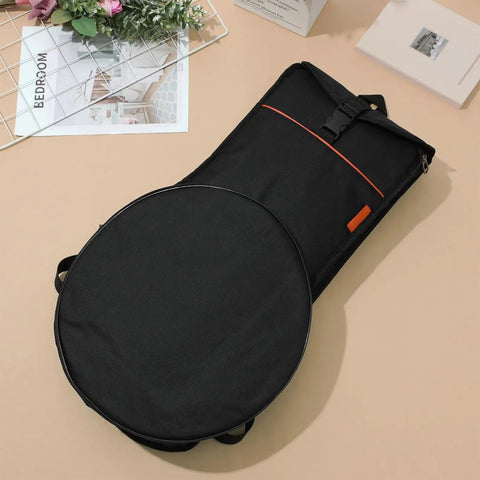 Dang Tough Dumb Drum Carrying Case Stitched From Heavy Gauge Waterproof Oxford Material To Store Percussion Equipment Safely And Keep Things Slick While You Cruise Down The Interstate In Solid Black with a circular design and pockets.
