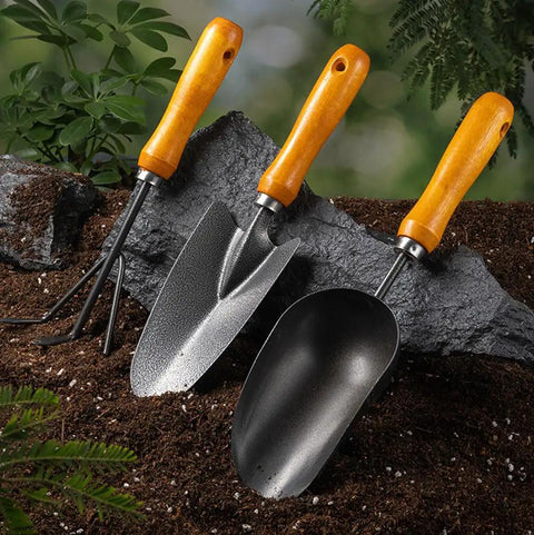 Set of garden tools with wooden handles, including a 12.6-Inch Garden Hand Trowel With Wooden Handle And Rust-Resistant Steel Head.