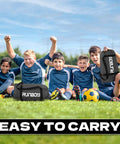 Kids with carry bags on a field playing soccer, showcasing the 9x5 Feet Portable Kids Soccer Goal For Backyard Practice With Carry Bag Foldable Trapezoidal Frame Durable 420D Oxford Cloth Net Ideal For Teens Juniors And Adults Easy Setup Soccer Goal.