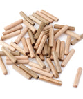 Rock Solid Wooden Dowel Pins Fifty Pieces Eight Millimeter By Forty Millimeter Eucalyptus Wood Rods scattered on white background.