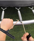 Using 4 Pack Trampoline Spring Puller Tool With T Hook Extension And Ergonomic Handle Grip for mini trampoline setup