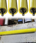 2 Inch Diameter Conveyor Belt Replacement Roller Made From Metal Steel Built Tough Heavy Duty Universal Replacement Roller With Customizable Lengths To Fit A Bunch Of Conveyor Projects, Designed For PVC Unpowered Rollers, yellow roller in conveyor setup