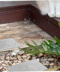 Concrete Paver Molds For Garden Paths And Patios, Reusable Forms With Antique Design For Residential Areas shown in garden