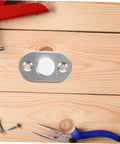 Sliding Door Floor Guide Roller And Barn Door Stopper for Smooth Easy Install, steel and nylon, uninstalled on wood surface.