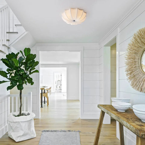 White Fabric Drum Shade Flush Mount Ceiling Light Fixture Three Light Modern Chandelier in a bright hallway
