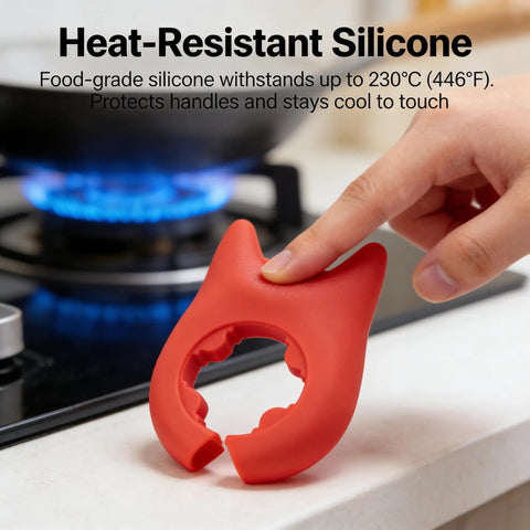 A hand holds red silicone utensil holder near stove, part of Red And Green Silicone Spoon Rests Set For Ladles, Tongs, Spatulas.