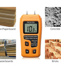 Wood Moisture Meter Digital Pin Type Moisture Detector For Wood Firewood Paper And Floor showing readings on materials.
