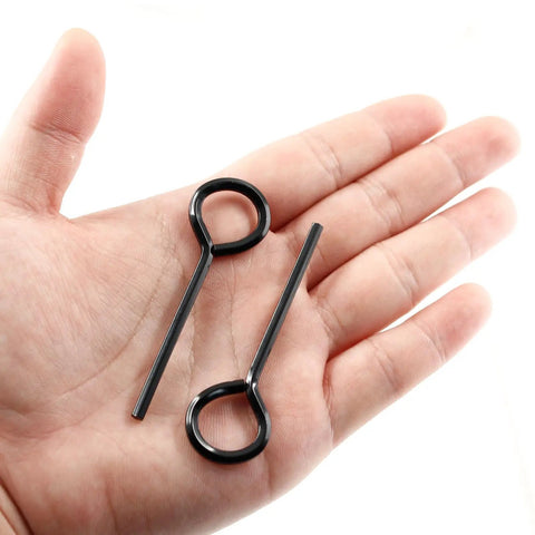 Hand holding two pieces from 12 Piece Hex Dogging Key Set With Full Loop For Key Ring, black durable steel hex keys