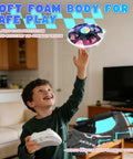 Child plays with UFO Hand Controlled Drone For Kids, Safe RC Toy With 7 LED Lighting Modes, living room setting, gesture control