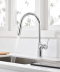SUMERAIN Kitchen Faucet with Pull Down Sprayer Dual Mode Brushed Gold, chrome faucet in kitchen sink with flowing water.