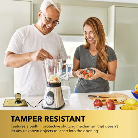 Couple using blender beside 20A Tamper-Resistant Receptacle Floor Box With Flip Lid And Brass Cover in kitchen countertop.