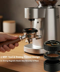 Premium Wdt Tool For Espresso Coffee Distribution Featuring Ten Stainless Steel Needles And Triple Gear Spinner With Twenty Four Strong Magnets, in action with a dosing funnel.