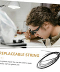 Person using glasses repair thread for half-rim eyewear maintenance at a workstation with tools nearby.