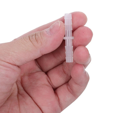 10 Pc Double Ended Barbed Hose Connector Repair Kit For Plastic Tube DIY Fixes No Tools Needed Hydroponics Piping Coupler Emergency Patch, clear plastic barb fitting held in hand