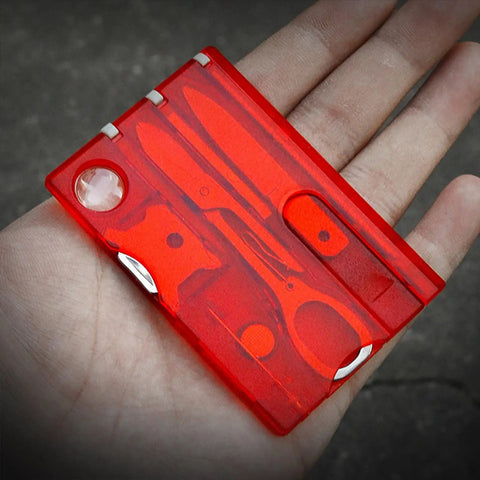14-In-1 Survival Card Tool With LED Light, ultra compact 2Cr13 stainless steel multitool in card size held on a hand, black red