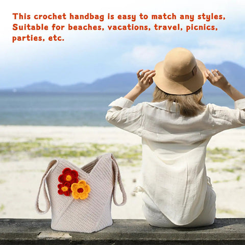Woman sitting on the beach with Beginner Crochet Bag Kit Complete Starter Set With Yarn, Hooks, Tools And Step By Step Video Tutorials For DIY Tote Bag Crafting Beige Gift For Adults tote.