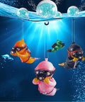 Two Pack Floating Diver Aquarium Decor Set With Adjustable Line, pink and green resin divers with floating balls in tank