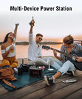 Three people using Portable 237Wh Solar Generator, enjoying music and drinks on a dock, powered by 300W Pure Sine Wave Power Station.