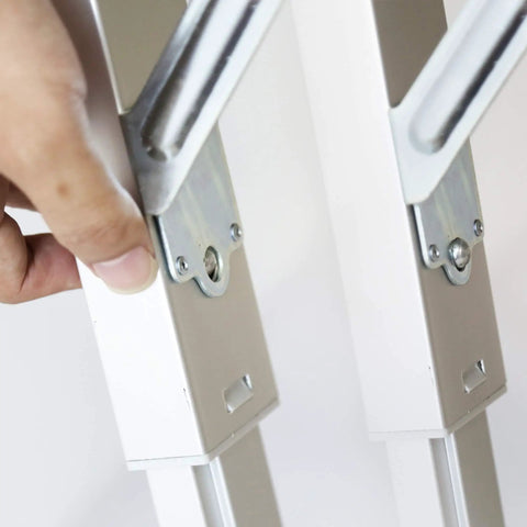 Close-up of adjustment mechanism on Four In One Portable Folding Workbench And Scaffold Platform With Creeper Carrier And Hand Truck Plus Jigsaw Blade Set For DIY Pros And Contractors Working On Home Projects.
