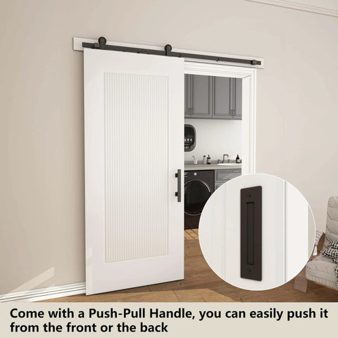 36x84 Reeded White Primed Sliding Barn Door With Matte Black 6ft Hardware Kit installed in living space