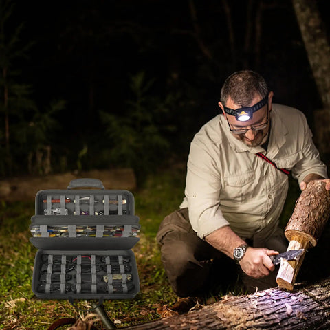 Heavy Duty 88 Slot Knife Display Case For 64 Plus Pocket Knives in grey, shown in an outdoor camping setting