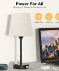 Set Of 2 Dimmable Touch Bedside Lamps With USB C And AC Outlet Charging Station, laptop and smart speaker on desk