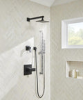 Avian 1-Handle Wall Mount Valve Trim Kit in Satin Black with Treysta Cartridge, installed in modern shower space.