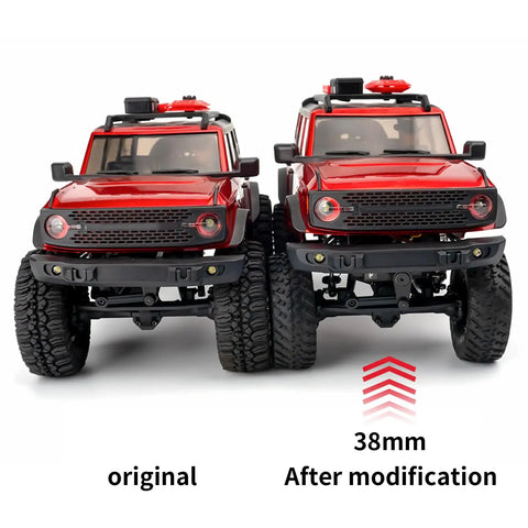 Comparison of standard vs Beefed Up 38mm Oil Shock Absorber For AXIAL SCX24 RC upgrade on red toy trucks in front view.