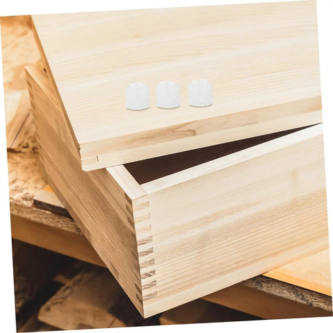 Two Hundred Piece Cabinet Fitting Kit With Rock Solid Self Tapping Screws And Heavy Duty Metal Connectors For No Sweat Drawer And Door Setup Plus Sturdy Shelf Support Bolts with white screw plug insert on wooden drawer.