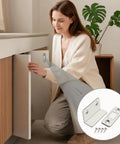 Woman installing Heavy Duty Magnetic Door Catch No Drill Invisible Latch for cabinet, secure closure demo with latching kit.