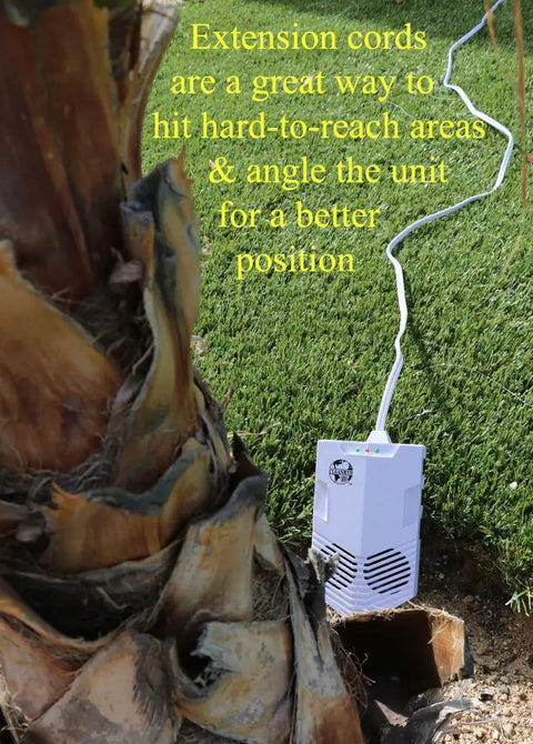 Advanced Ultrasonic Bat Deterrent System With BATONIC Tech placed outdoors near tree for garden pest control