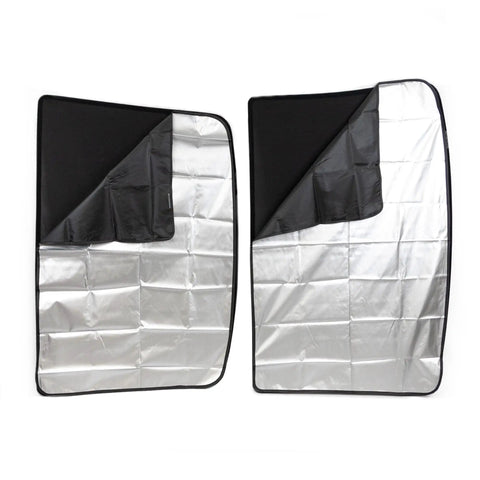 Custom Tailored Four Piece Tesla Model Y Sunroof Solar Shades In Slick Light Grey with black edges and shiny silver interior for heat blocking.