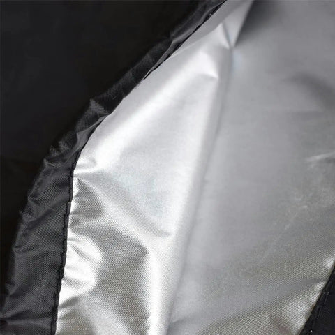 Close-up of silver-coated interior of Outdoor Swing Canopy Replacement Top Cover For 3 Seater Patio Swing Universal 191x120x18 Cm