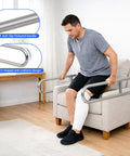 Built Tough 304 Stainless Steel Bathroom Grab Bar With Heavy Duty 510 Lb Capacity Fold Up Anti Slip Toilet Safety Rail And Rustproof Wall Mount Support For Seniors, used by man sitting on a couch.
